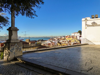 Fototapeta na wymiar A view of downtown Lisbon from Miradouro de Santo Estevao in famous Alfama neighborhood