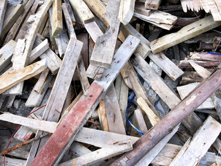 Pile of Construction Wooden Planks with Nails