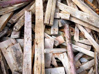 Pile of Construction Wooden Planks with Nails