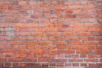 Old worn urban brick wall texture background