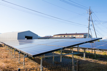 Obraz premium Solar power panels ,Photovoltaic modules for innovation green energy for life with blue sky background.