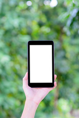 Hand holding modern smart phone with blank screen for  text message or content.