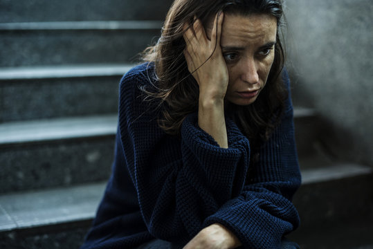 Woman Sitting Stressful on The Stairway