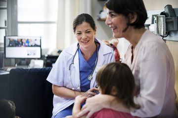 Fototapeta premium Young patient is getting a diagnose from doctor
