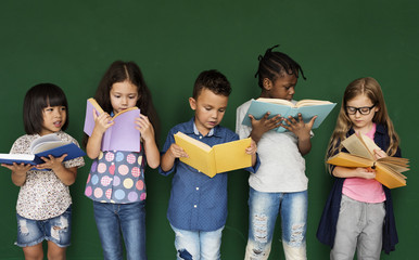 Group of school kids reading for education - Powered by Adobe