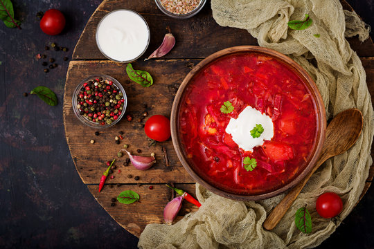 Traditional Ukrainian Russian borscht with white beans on the  bowl.