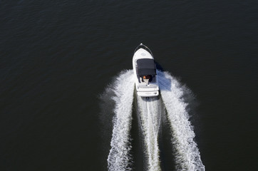 fast motor boat on the water surface