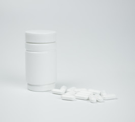 Pills on white background