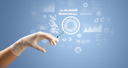 Female doctor holding syringe