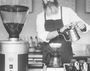 Barista is making coffee