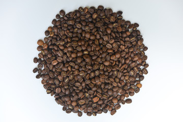 Coffee bean put in like circle on the white screen isolated