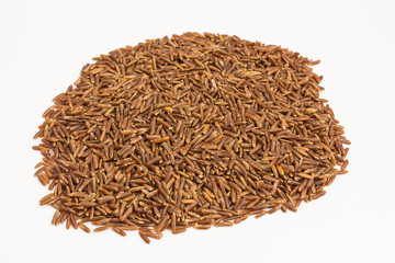 heap of red rice grains