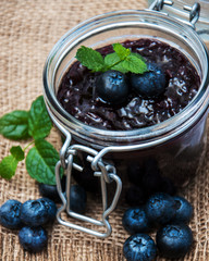 Jar with blueberry jam