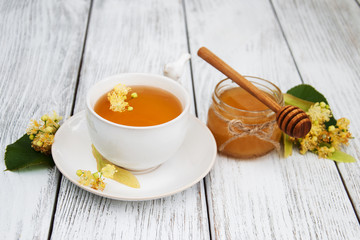 cup of herbal tea with linden flowers