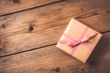 Gift on white wooden table. Christmas background. top view