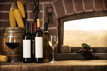 Cellar window and wine bottles