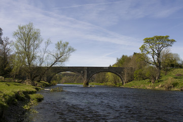 Fototapeta na wymiar The Tweed bridge over the Tweed which was the old route of the A7