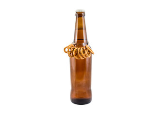 Bottle of beer with pretzels isolated on white.