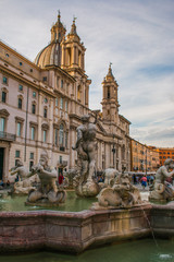 Fototapeta na wymiar Chiesa di Sant'Agnese in Agone e fontana dei quattro fiumi in Piazza Navona a Roma