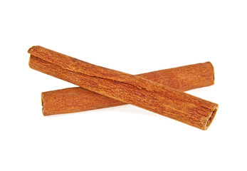 Few cinnamon sticks on a white background