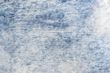 Abstract texture of light blue jeans fiber. Abstract background.