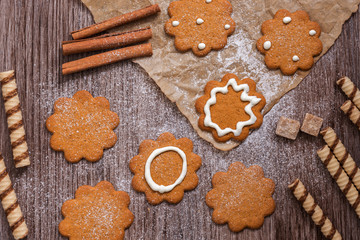 Ginger biscuits on a wooden table, top view.