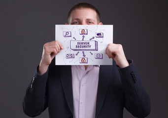 The concept of business, technology, the Internet and the network. Young businessman showing...