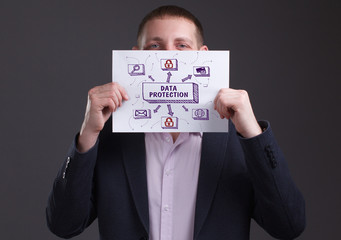 The concept of business, technology, the Internet and the network. Young businessman showing...