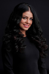 Fototapeta premium Gorgeous brunette with curly hair
