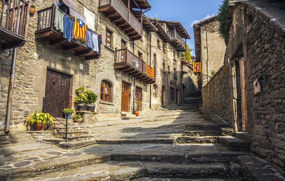 Old stone street in the medieval town of Rupit, Catalonia