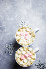Hot chocolate marshmallow winter drink. Cristmas holiday  postcard snowman concept. Top view, space for text.
