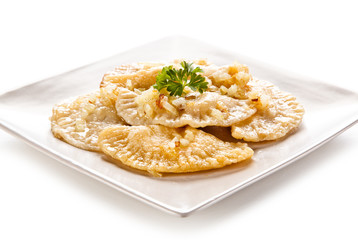 Dumplings - stuffed cheese noodles on white background 