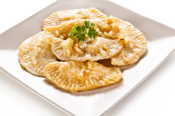 Dumplings - stuffed cheese noodles on white background 
