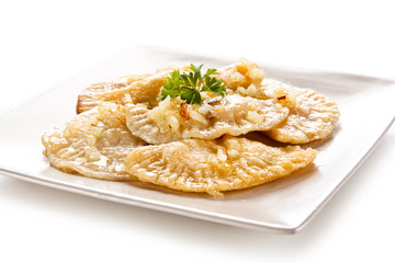 Dumplings - stuffed cheese noodles on white background 
