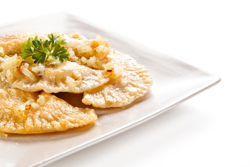 Dumplings - stuffed cheese noodles on white background 