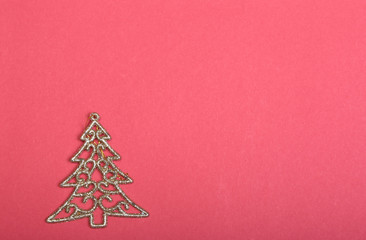Naklejka na ściany i meble Golden christmas fir tree decoration on glitter background