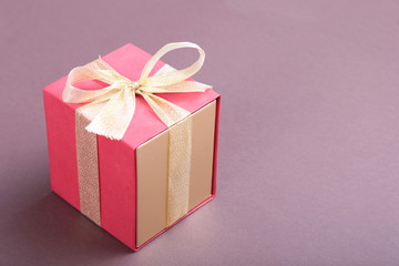 Gift boxes with bow on wood background