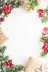 Fototapeta na wymiar Christmas and New Year holiday background. Xmas greeting card. Snow effect. Flat lay