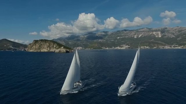 Aero shooting of two yachts in the open sea