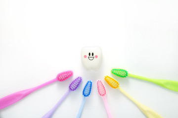 Toys teeth dental in a smiling mood with tooth brush colorful