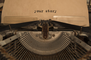 your story typed words on a Vintage Typewriter. Mechanisms closeup. Typing on old typewriter