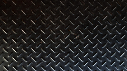 Rusty black diamond pattern iron metal plate
