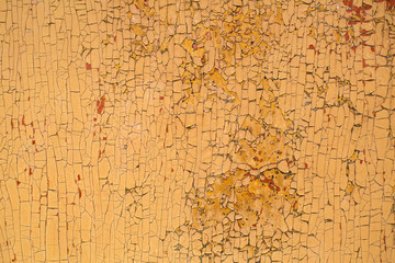 Wood texture - peeling paint on old wooden rustic material on the wall.