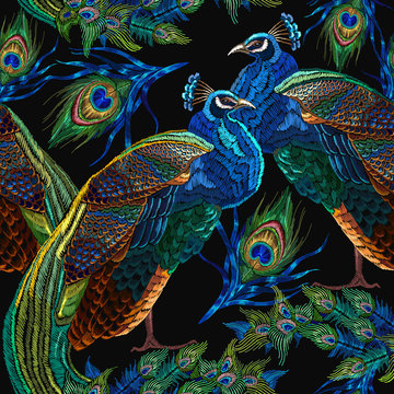 Embroidery peacocks seamless pattern. Classical fashionable embroidery beautiful peacocks. Fashionable template for design of clothes. Tails of peacocks