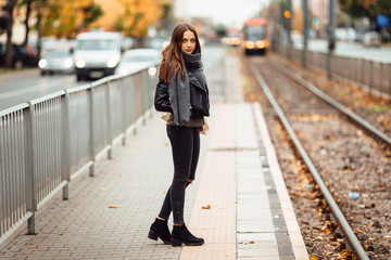 Beautiful girl wait for her trolleybus