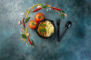 Traditional asian noodle lagman with vegetables and meat. Top view. Christmas concept