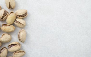 pistachio nuts isolated on white background. Top view.