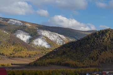 The first snow in the mountains of the Altai Republic
