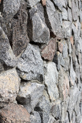 Rubble gray and brown stone wall, rubblework