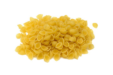 bunch of pasta in the shape of cockleshells on a white background